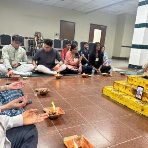 HMEC attendees learning Agnihotra rituals